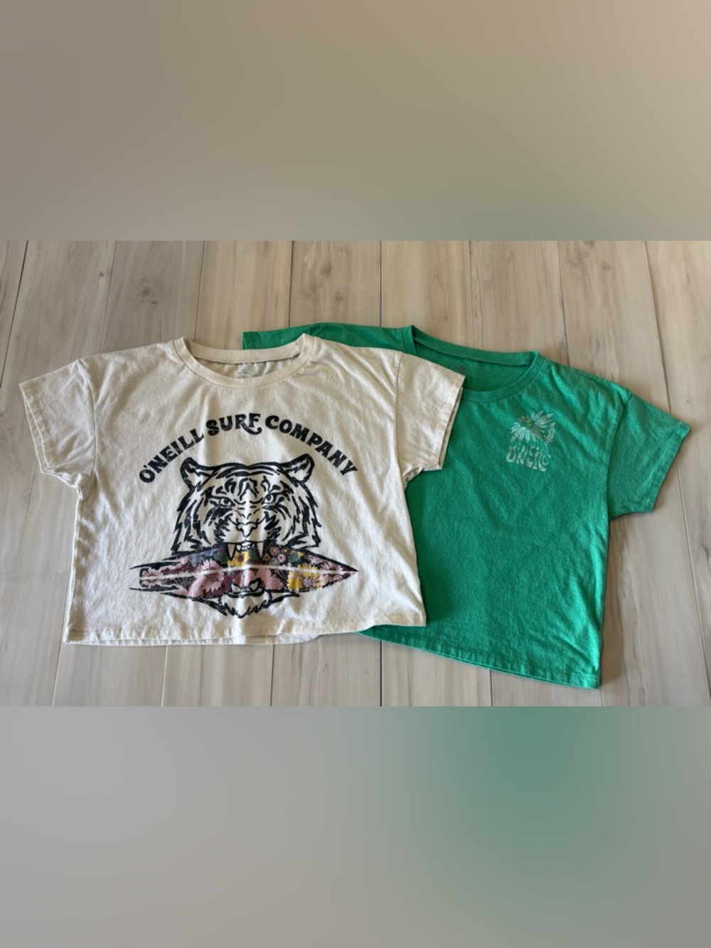 TWO O'Neill oversized crop tops , women’s